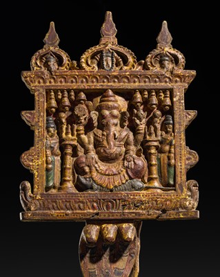Lot 629 - A POLYCHROME PAINTED AND CARVED WOOD PANEL DEPICTING GANESHA