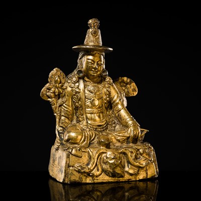Lot 315 - A RARE MINIATURE GILT-BRONZE FIGURE OF KING GESAR, CENTRAL TIBET, 18TH CENTURY
