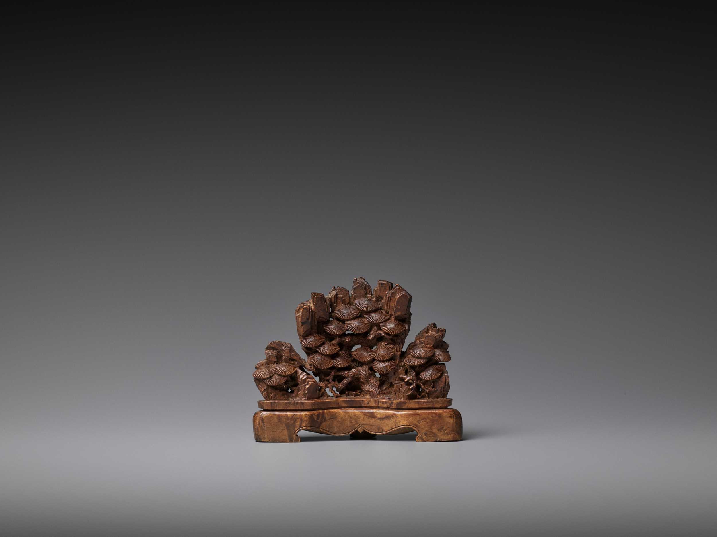 Lot 536 - A CARVED BAMBOO PINE-FORM BRUSH REST, QING