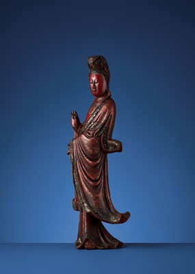 Lot 779 - A VIETNAMESE RED AND GILT-LACQUERED WOOD STATUE OF GUANYIN