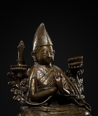 A BRONZE FIGURE OF TSONGKHAPA, TIBET, 18TH-19TH CENTURY