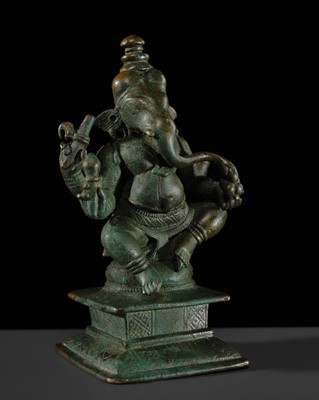 Lot 216 - A BRONZE FIGURE OF GANESHA, SOUTH INDIA, LATER CHOLA PERIOD, 12TH-13TH CENTURY