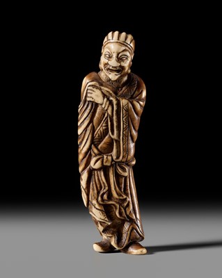 Lot 310 - A TALL ANTLER NETSUKE OF A CHINESE IMMORTAL