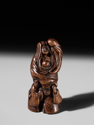 Lot 241 - GYOKUSEN TOMOCHIKA: A WOOD NETSUKE OF LADY TOKIWA GOZEN PROTECTING HER CHILDREN