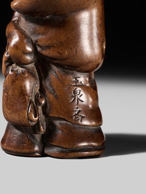 Lot 241 - GYOKUSEN TOMOCHIKA: A WOOD NETSUKE OF LADY TOKIWA GOZEN PROTECTING HER CHILDREN