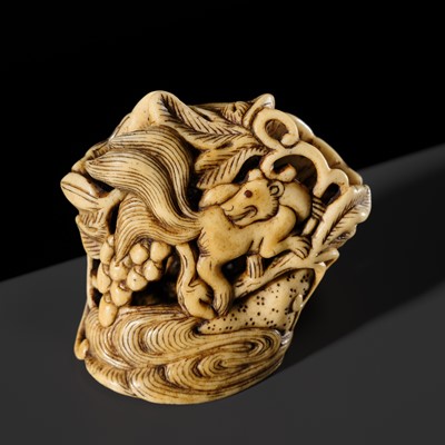 Lot 302 - A RARE ANTLER NETSUKE DEPICTING SQUIRRELS AND GRAPES