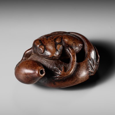 SAZANAMI: A FINE WOOD NETSUKE OF A TOAD AND HYOTAN