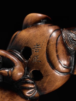 Lot 93 - YOSHIMASA: A SUPERB WOOD NETSUKE OF THE DEMON IBARAKI