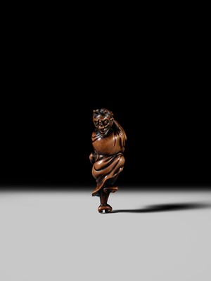 Lot 93 - YOSHIMASA: A SUPERB WOOD NETSUKE OF THE DEMON IBARAKI