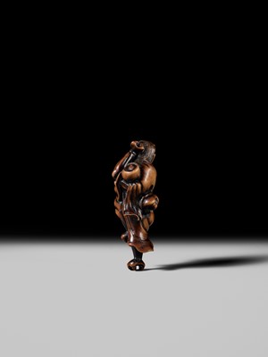 Lot 93 - YOSHIMASA: A SUPERB WOOD NETSUKE OF THE DEMON IBARAKI