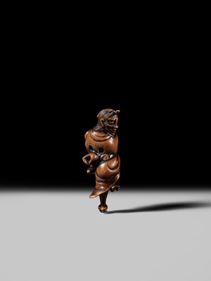 Lot 93 - YOSHIMASA: A SUPERB WOOD NETSUKE OF THE DEMON IBARAKI