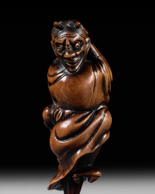 Lot 93 - YOSHIMASA: A SUPERB WOOD NETSUKE OF THE DEMON IBARAKI