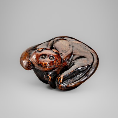 A CHARMING LACQUERED WOOD NETSUKE OF A CAT