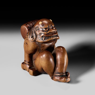 Lot 209 - A POWERFUL WOOD NETSUKE OF RAIJIN WITH DRUM