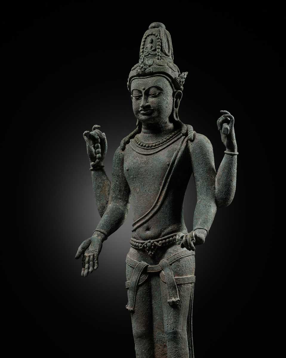 A LARGE BRONZE FIGURE OF AVALOKITESHVARA, SRIVIJAYA EMPIRE, 9TH-11TH CENTURY