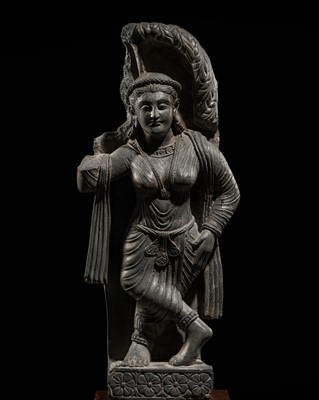 Lot 229 - A RARE AND LARGE SCHIST FIGURE OF A YAKSHI, GANDHARA, 2ND-3RD CENTURY