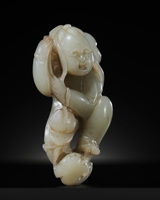 Lot 441 - A CELADON JADE FIGURE OF LIU HAI AND HIS THREE-LEGGED TOAD, EARLY QING DYNASTY