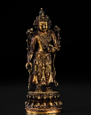 Lot 78 - AN IMPERIAL AND EXCEEDINGLY RARE GILT-BRONZE FIGURE OF AVALOKITESHVARA, YONGLE MARK AND PERIOD