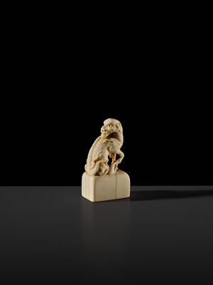 Lot 99 - MUNEHARU: A FINE KYOTO SCHOOL IVORY SEAL-TYPE (INGYO) NETSUKE OF A YOUNG KIRIN