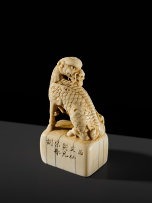 Lot 99 - MUNEHARU: A FINE KYOTO SCHOOL IVORY SEAL-TYPE (INGYO) NETSUKE OF A YOUNG KIRIN