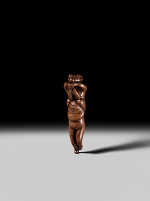 Lot 85 - A RARE AND AMUSING WOOD NETSUKE OF TWO TANUKI