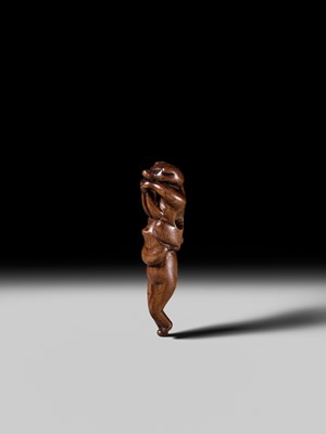 Lot 85 - A RARE AND AMUSING WOOD NETSUKE OF TWO TANUKI