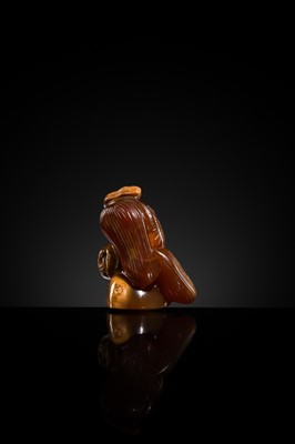 A FINE AGATE ‘NUTS AND JUJUBE' PENDANT, QING DYNASTY, 19TH CENTURY