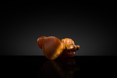 A FINE AGATE ‘NUTS AND JUJUBE' PENDANT, QING DYNASTY, 19TH CENTURY
