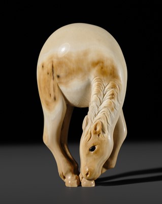 Lot 381 - STRECKFUSS: A CONTEMPORARY MAMMOTH TUSK NETSUKE OF A HORSE