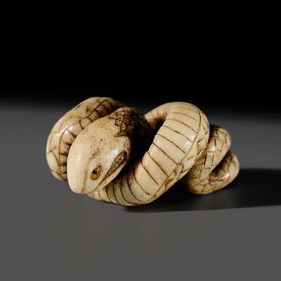 Lot 305 - A RARE ANTLER NETSUKE OF A COILED SNAKE
