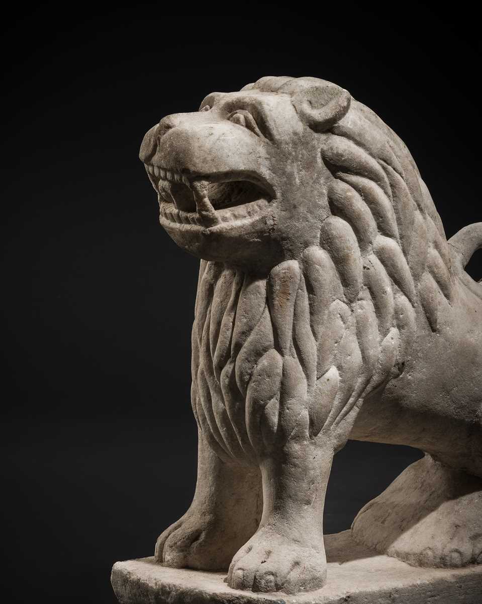 Lot 91 - A LARGE WHITE MARBLE FIGURE OF A GUARDIAN LION, NORTHWESTERN INDIA, 18TH-19TH CENTURY OR EARLIER