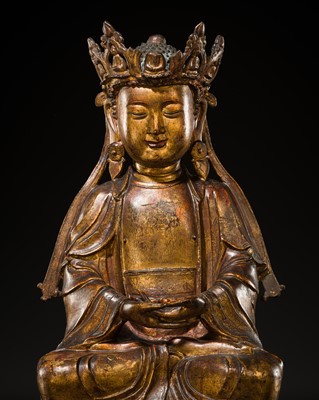 Lot 84 - A RARE GILT-LACQUERED BRONZE FIGURE OF AMITABHA BUDDHA, LATE MING TO EARLY QING DYNASTY