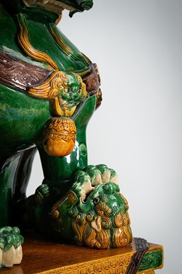Lot 376 - A VERY LARGE SANCAI-GLAZED PAIR OF BUDDHIST LIONS, QING