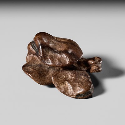 Lot 286 - NAOMASA: A FINE WOOD NETSUKE OF A SORAMAME (BROAD BEANS)