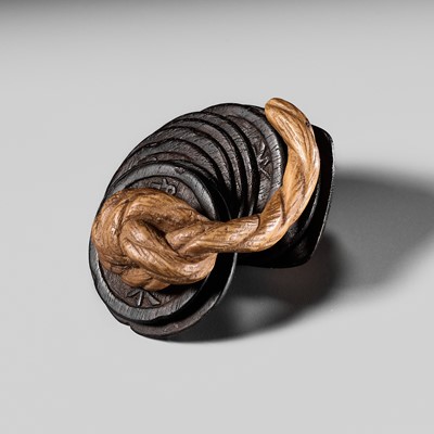 Lot 287 - A FINE WOOD NETSUKE OF COINS ON A STRING