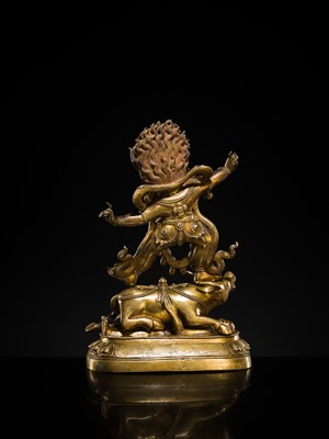 Lot 23 - A LARGE GILT-BRONZE FIGURE OF YAMA DHARMARAJA, 17TH-18TH CENTURY