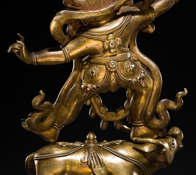 Lot 23 - A LARGE GILT-BRONZE FIGURE OF YAMA DHARMARAJA, 17TH-18TH CENTURY