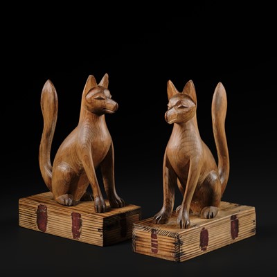 Lot 198 - A PAIR OF WOOD CARVINGS OF FOXES (KITSUNE), MEIJI TO TAISHO PERIOD