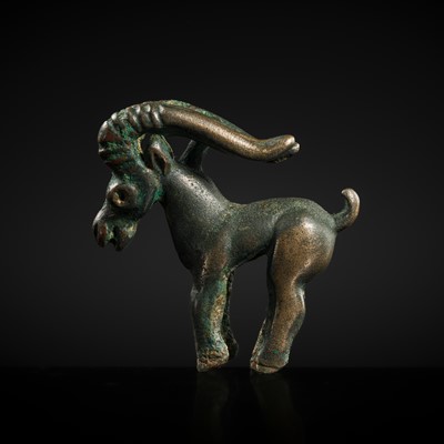 Lot 117 - A CHARMING BRONZE ORNAMENT OF AN IBEX, 5TH-4TH CENTURY BC