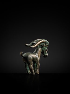 Lot 117 - A CHARMING BRONZE ORNAMENT OF AN IBEX, 5TH-4TH CENTURY BC
