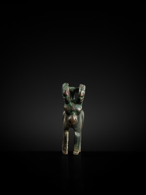 Lot 117 - A CHARMING BRONZE ORNAMENT OF AN IBEX, 5TH-4TH CENTURY BC