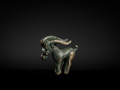 Lot 117 - A CHARMING BRONZE ORNAMENT OF AN IBEX, 5TH-4TH CENTURY BC