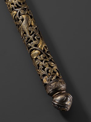 Lot 5 - A RETICULATED GILT-DAMASCENED IRON PEN CASE, TIBET, 15TH-16TH CENTURY