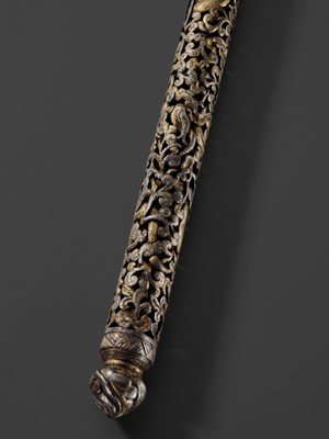 Lot 5 - A RETICULATED GILT-DAMASCENED IRON PEN CASE, TIBET, 15TH-16TH CENTURY