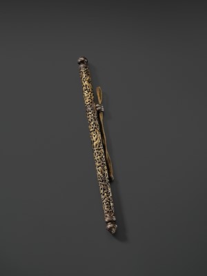 Lot 5 - A RETICULATED GILT-DAMASCENED IRON PEN CASE, TIBET, 15TH-16TH CENTURY