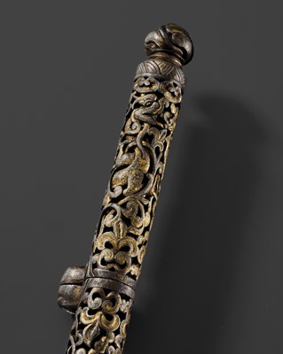 Lot 5 - A RETICULATED GILT-DAMASCENED IRON PEN CASE, TIBET, 15TH-16TH CENTURY