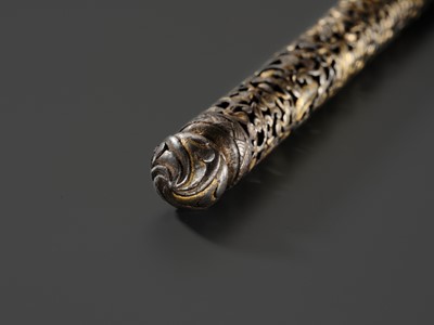 Lot 5 - A RETICULATED GILT-DAMASCENED IRON PEN CASE, TIBET, 15TH-16TH CENTURY