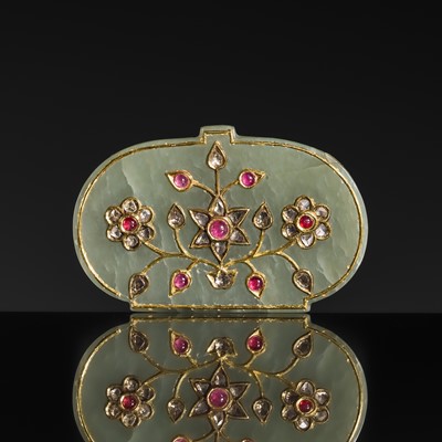 Lot 606 - A DIAMOND, RUBY, AND GOLD-INLAID JADE PENDANT, HALDILI, 18TH-19TH CENTURY