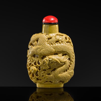 Lot 489 - A RARE CARVED AND ENAMELED PORCELAIN ‘DRAGON’ SNUFF BOTTLE, WANG BINGRONG, 1820-1870