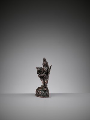 Lot 93 - A SILVER-INLAID BRONZE FIGURE OF HERUKA AND CONSORT, QING